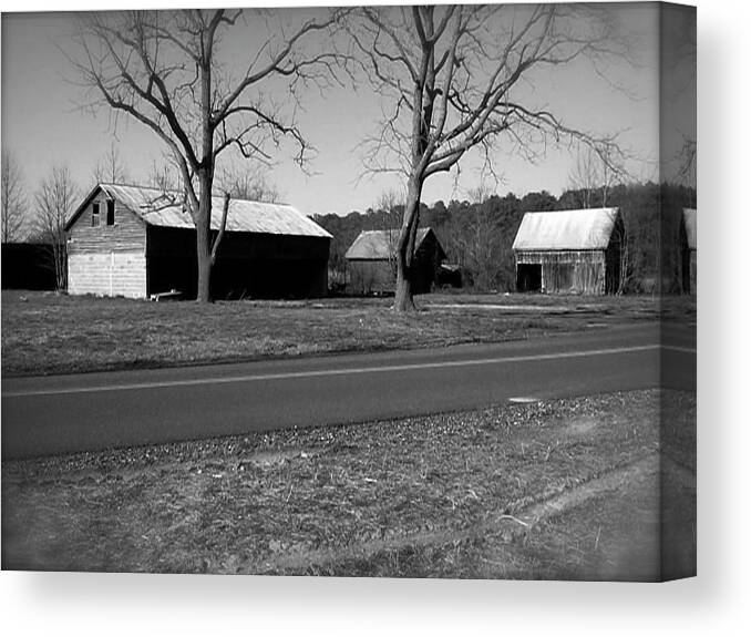  Canvas Print featuring the photograph Old Red Barn In Black and White by Chris W Photography AKA Christian Wilson