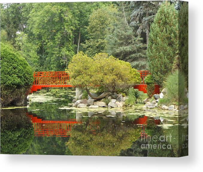 Red Canvas Print featuring the photograph Red Bridge Reflection in a Pond by Erick Schmidt