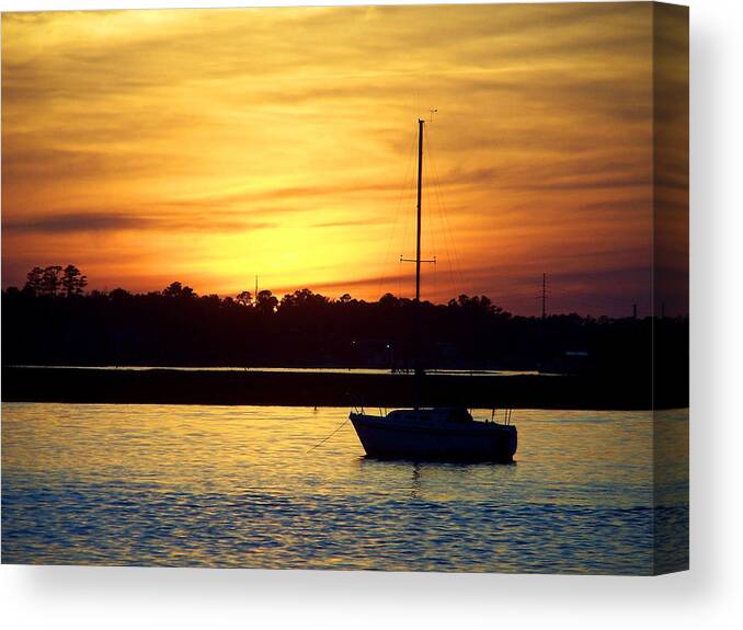 Sailboat Canvas Print featuring the photograph Resting In A Mango Sunset by Sandi OReilly