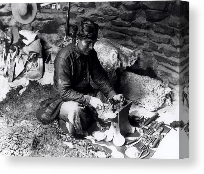 William J Carpenter Canvas Print featuring the photograph Silversmith at work by William J Carpenter
