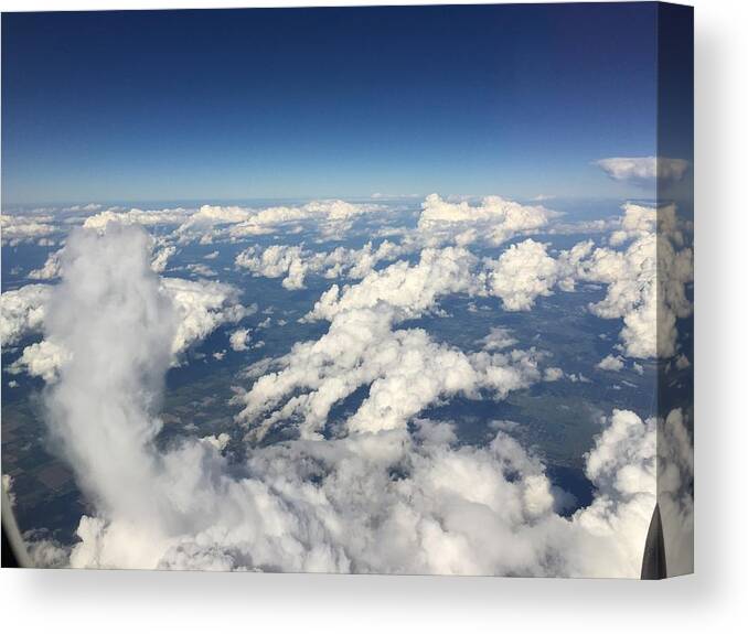 Clouds Canvas Print featuring the photograph Skyline view of clouds by Sue Morris