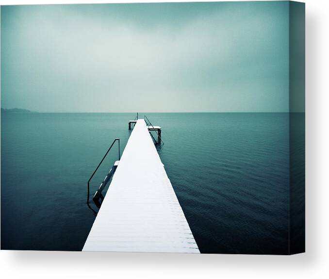 Tranquility Canvas Print featuring the photograph Snow Covered Jetty by Daitozen