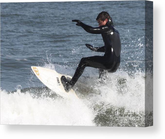 Surfer On White Water Canvas Print featuring the photograph Surfer on White Water by John Telfer