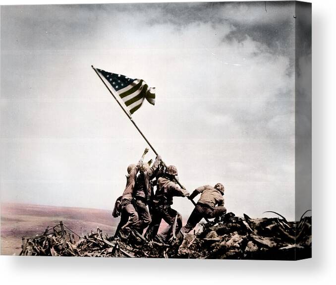 The Flag Raising Canvas Print featuring the photograph The flag raising at Iwo Jima World War II by Celestial Images