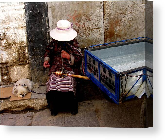 Tibet Canvas Print featuring the photograph Tibet - Lhasa - Woman and Companion by Jacqueline M Lewis