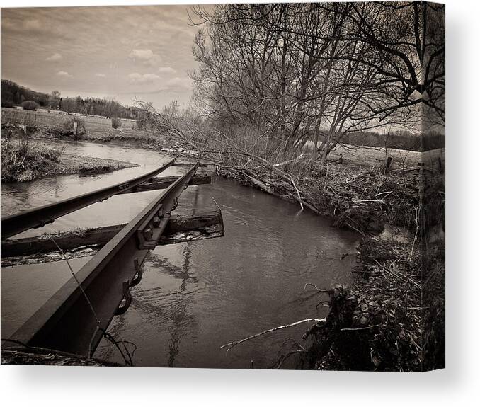 Decay Canvas Print featuring the photograph Tracks washed out by Chris Bordeleau