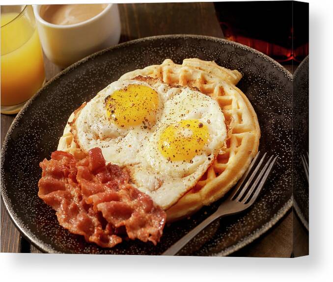 Breakfast Canvas Print featuring the photograph Waffles With Fried Eggs And Bacon by Lauripatterson