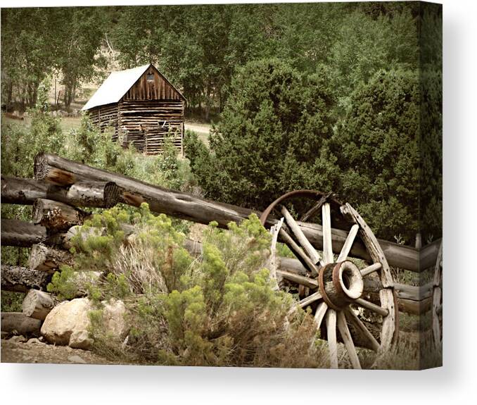 Cabin Canvas Print featuring the photograph Wagon Wheel by KATIE Vigil