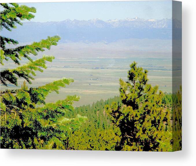 Sky Canvas Print featuring the photograph Wallowa Mountains by Bill TALICH