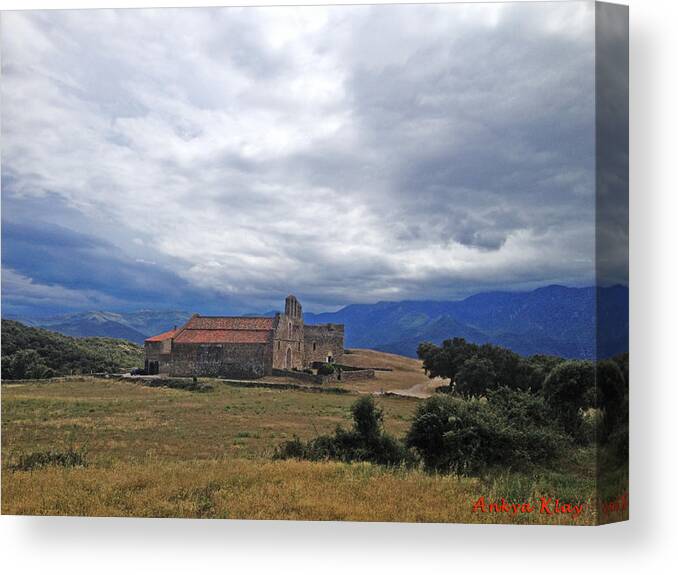The Priory Of Marcevol Has Been A Place Of Pilgrimage For Centuries. Perched High On The Arbussols Plateau Canvas Print featuring the photograph Wild Place of Pilgrimage by Ankya Klay