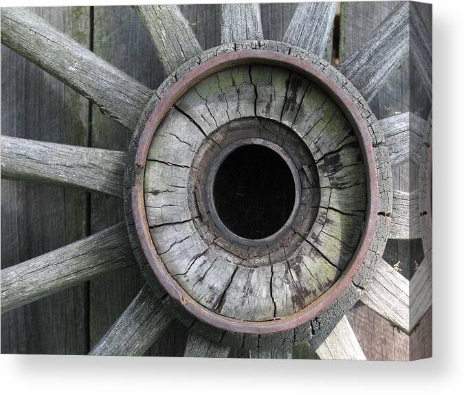 Wheel Canvas Print featuring the photograph Wooden Wheel by Natalie Rotman Cote