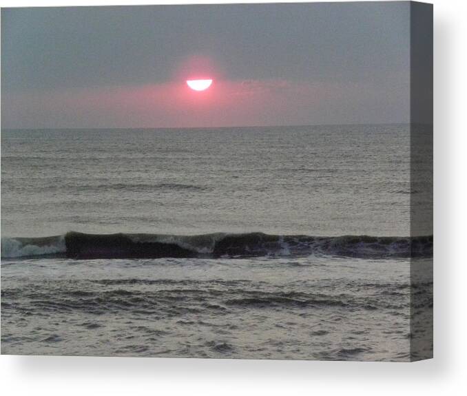 Sunrise Canvas Print featuring the photograph A Glow In The Clouds by Kim Galluzzo