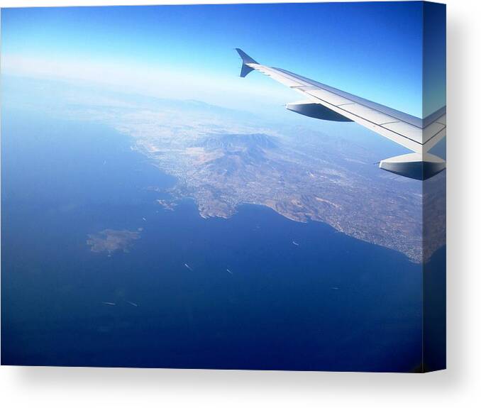 Athens Canvas Print featuring the photograph Airplane Wing Aerial View Mediterranean Sea South of Greece on the Way Towards Athens Greece by John Shiron