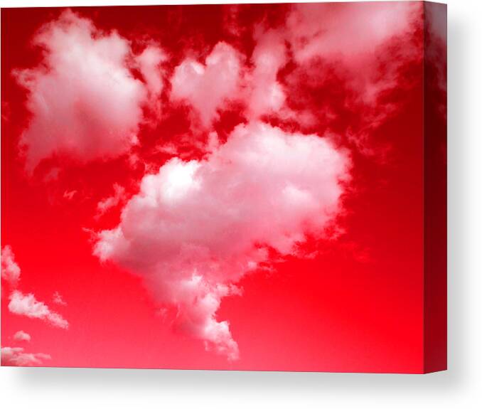 Clouds Canvas Print featuring the photograph Clouds With Red Sky by Steve Fields