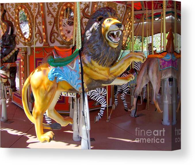 Mary Deal Canvas Print featuring the photograph Lion Carousel Ride by Mary Deal