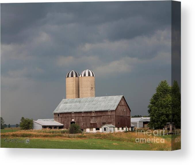 Dark Canvas Print featuring the photograph Ominous Clouds Over the Barn by J McCombie