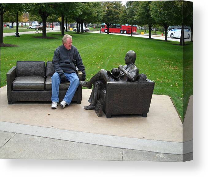 Cityscape Canvas Print featuring the photograph Talking to a Statue by Val Oconnor