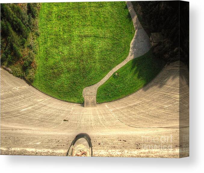 Water Dam Canvas Print featuring the photograph Water dam and a shoe by Mats Silvan
