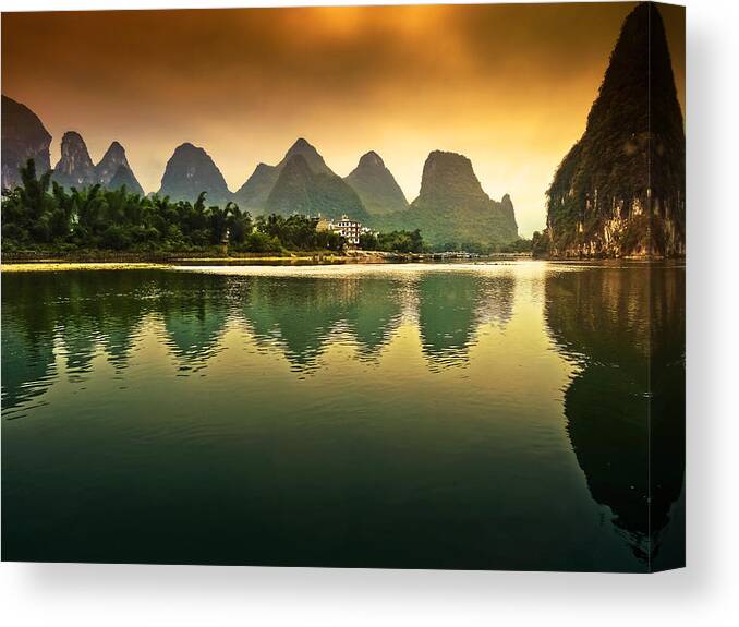 Sunset Canvas Print featuring the photograph Tranquil evening reflection-China Guilin scenery-Lijiang River in Yangshuo by Artto Pan