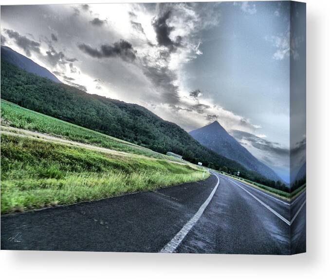 Landscape Canvas Print featuring the photograph A road to Cairns by Michael Blaine