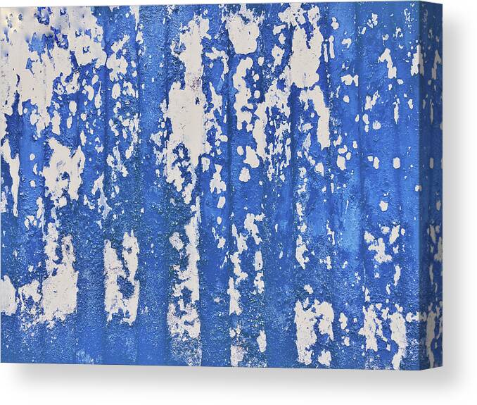 Abstract Canvas Print featuring the photograph Blue painted metal by Tom Gowanlock