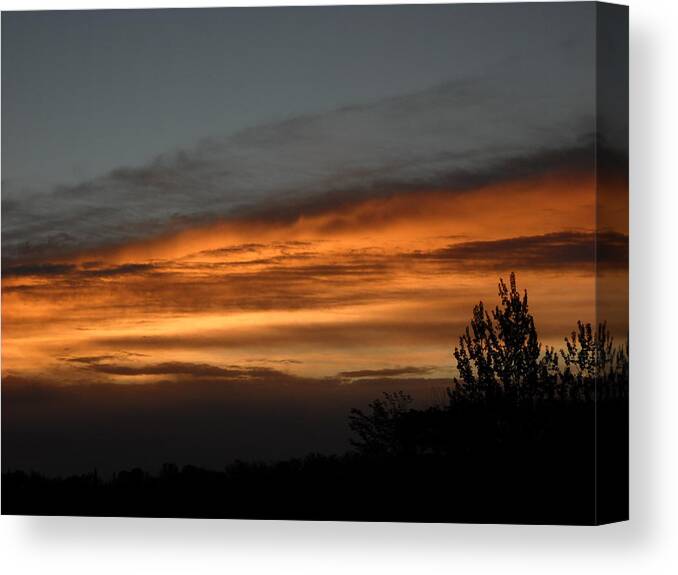 Dawn Canvas Print featuring the photograph Colorful Clouds in Dawn sky by Kent Lorentzen