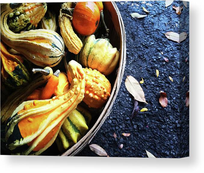 Gourd Canvas Print featuring the photograph Colorful gourds in a basket by GoodMood Art