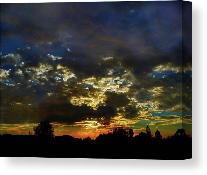 Sunset Canvas Print featuring the photograph Evening Glow by Mark Blauhoefer