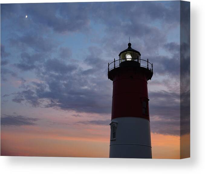 Blue Hour Canvas Print featuring the photograph Nauset Light lighthouse at sunset by Marianne Campolongo