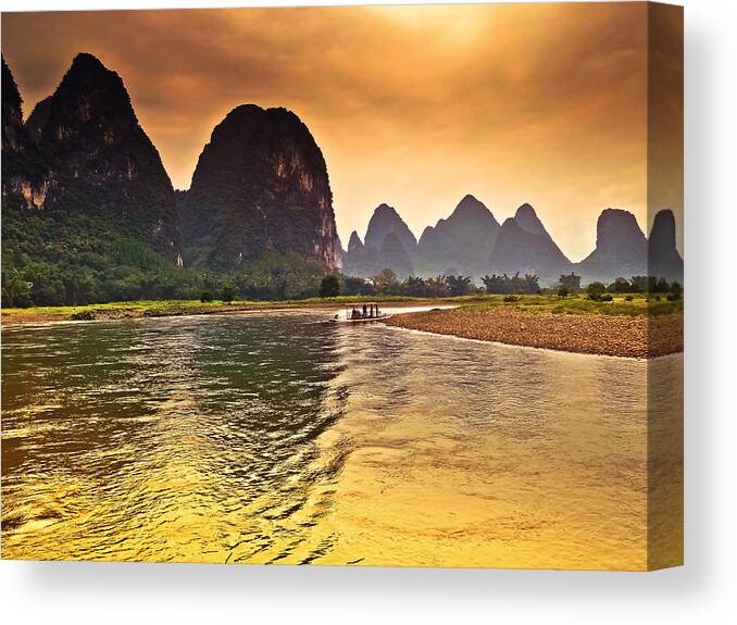 Sunset Canvas Print featuring the photograph Riverside scenery like gold-China Guilin scenery Lijiang River in Yangshuo by Artto Pan