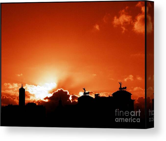 Rome Canvas Print featuring the photograph Silhouette of Rome against a sunset sky by Stefano Senise