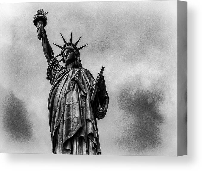 Ellis Island Canvas Print featuring the photograph Statue of Liberty Photograph by Louis Dallara