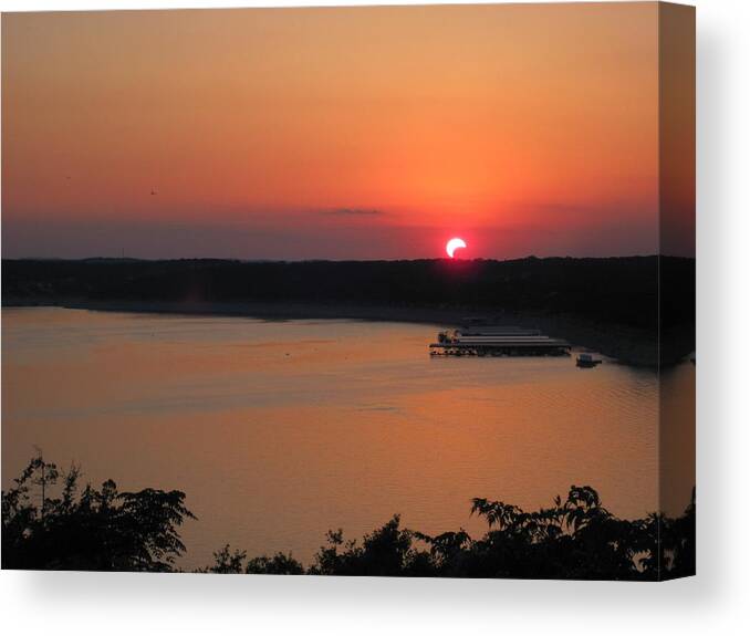 Solar Eclipse Canvas Print featuring the photograph Sunset eclipse. by Life Makes Art