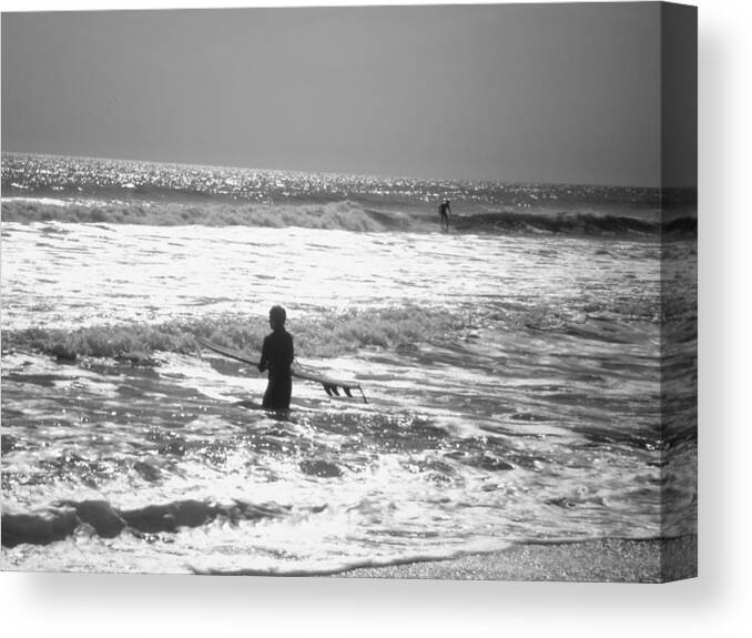 Surf Canvas Print featuring the photograph Surfers by Cat Rondeau