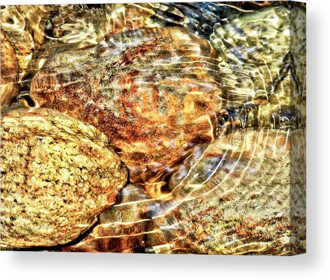 Waves Canvas Print featuring the photograph Wavy Water on Colorful Rocks by Kirsten Giving