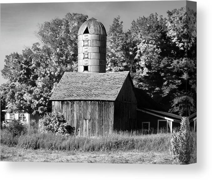 Silo Canvas Print featuring the photograph Weathered Barn and Silo B W by David T Wilkinson