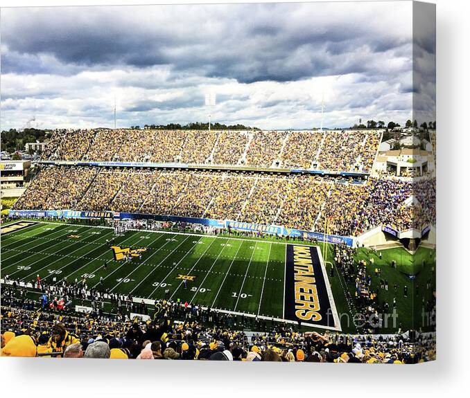 West Virginia University Canvas Print featuring the photograph WVU Football by Kevin Gladwell