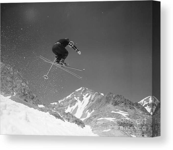 Skiing Canvas Print featuring the photograph Alf Engen In Mid Air Leap On Skis by Bettmann