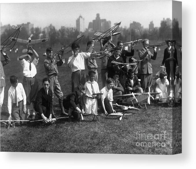 Young Men Canvas Print featuring the photograph Boys 16-19 With Model Airplanes by Bettmann