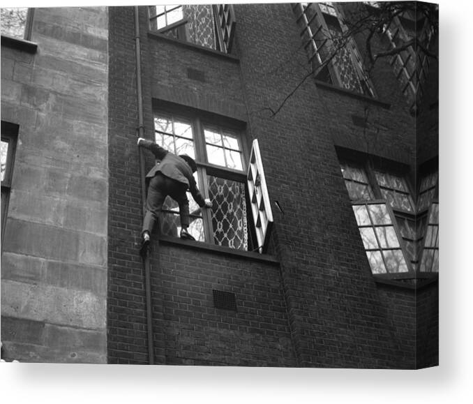 Working Canvas Print featuring the photograph Cat Burglar by Topical Press Agency