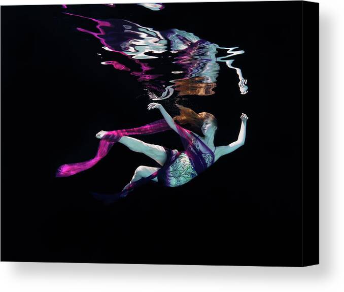Underwater Canvas Print featuring the photograph Female Dancer Floating Underwater by Thomas Barwick