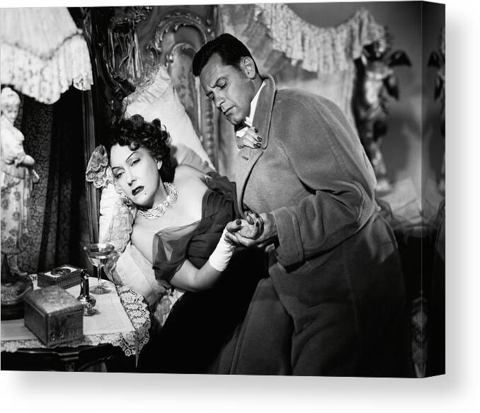 Gloria Swanson Canvas Print featuring the photograph GLORIA SWANSON and WILLIAM HOLDEN in SUNSET BLVD. -1950-. by Album