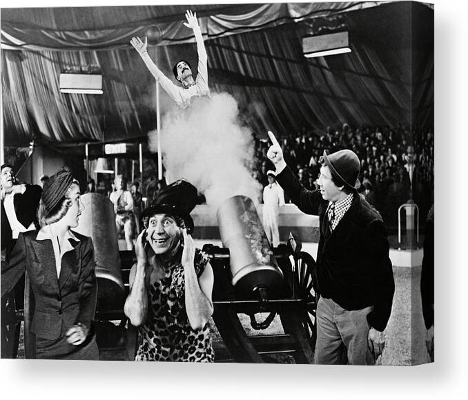 Chico Marx Canvas Print featuring the photograph HARPO MARX , CHICO MARX and GROUCHO MARX in AT THE CIRCUS -1939-. by Album