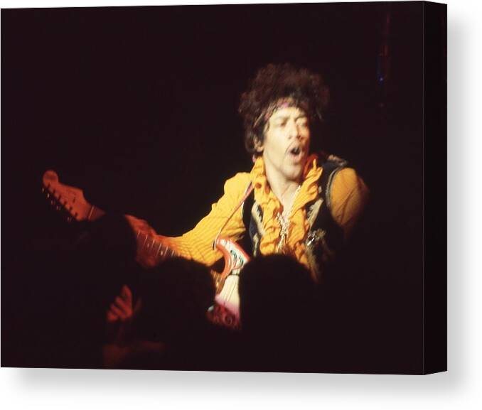 Jimi Hendrix Canvas Print featuring the photograph Jimi Hendrix Playing Guitar To Crowd by Jill Gibson