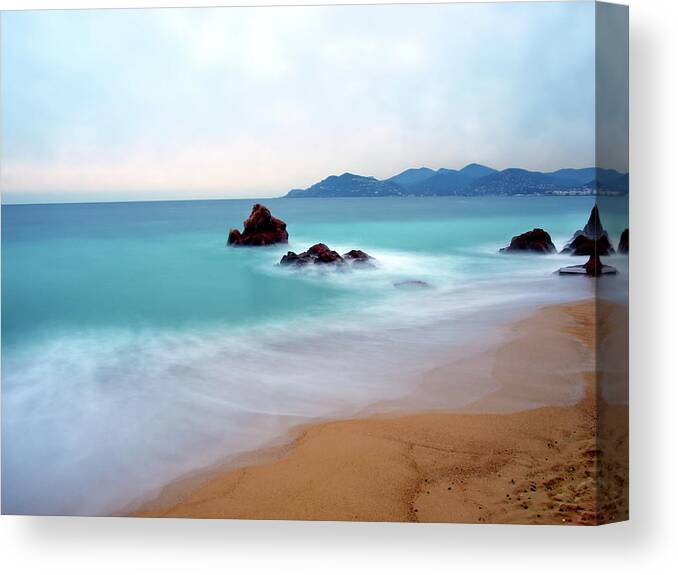Scenics Canvas Print featuring the photograph Long Exposure Of Blue Sea by Federica Fortunat