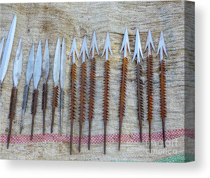 Arrowheads Canvas Print featuring the photograph metal products by Datoga blacksmith tribe c13 by Guy Sion
