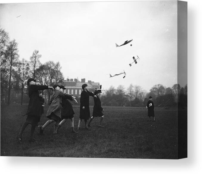 Child Canvas Print featuring the photograph Model Aeroplanes by Fox Photos