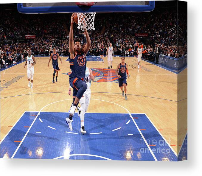 Isaiah Hicks Canvas Print featuring the photograph New York Knicks V Charlotte Hornets by Jesse D. Garrabrant