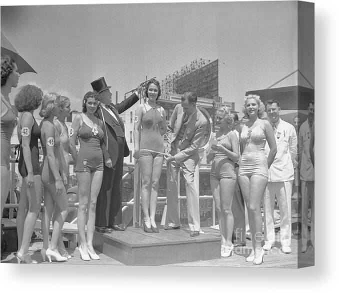 People Canvas Print featuring the photograph Officials Measuring Beauty Pageant by Bettmann