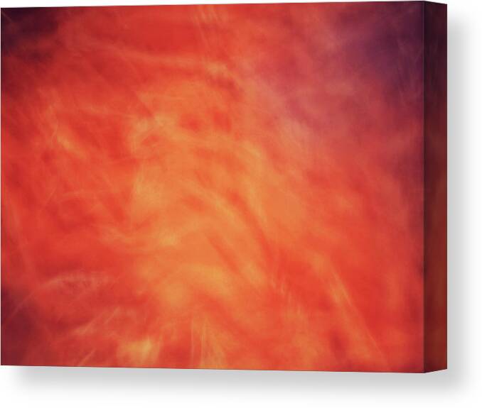 Abstract Canvas Print featuring the photograph Soft artistic fire like background of red, orange and yellow swirls by Teri Virbickis